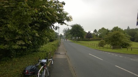 riders ahead on straight road